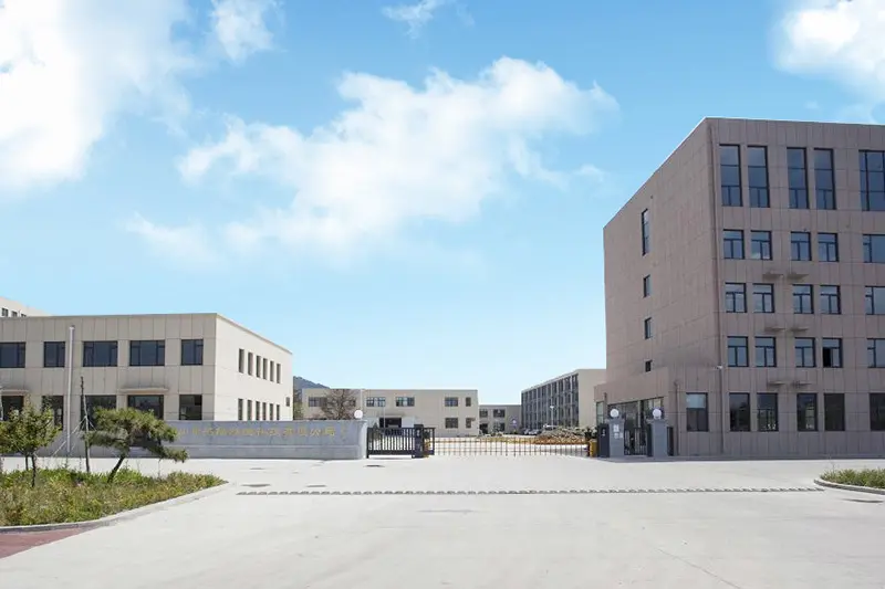 Factory buildings and entrance courtyard.